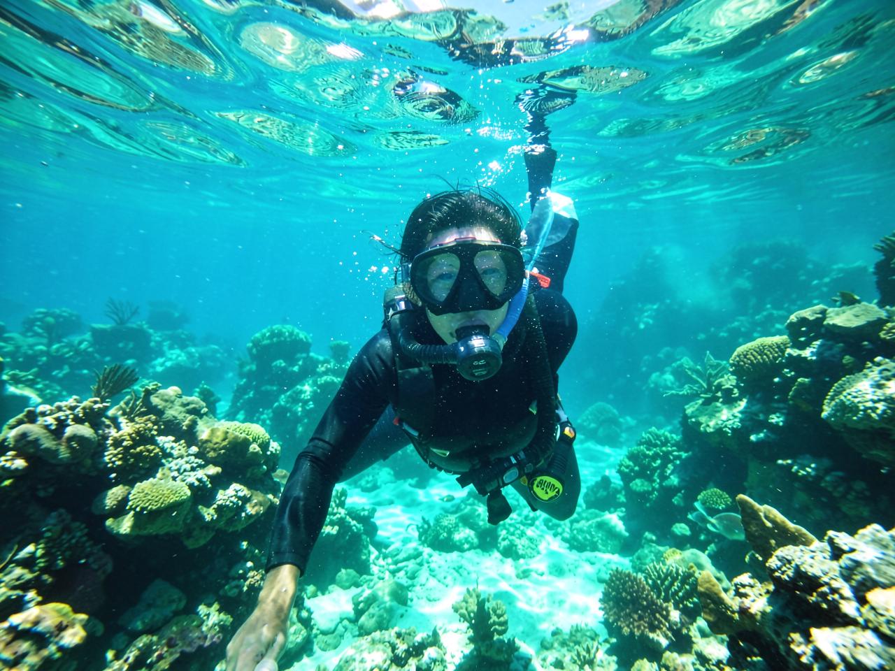Snorkeling over a reef in clear Caribbean water